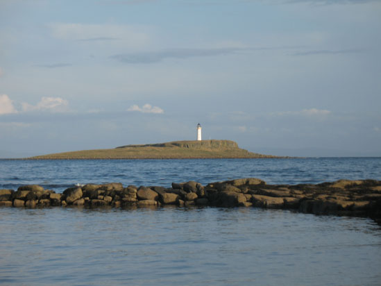 Picture of   Kildonan Isle and Lighthouse is shown on this page.