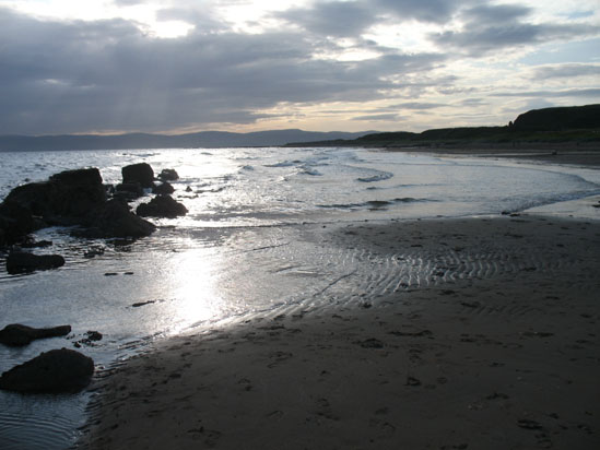 Picture of   Blackwaterfoot beach with the tide out is shown on this page.