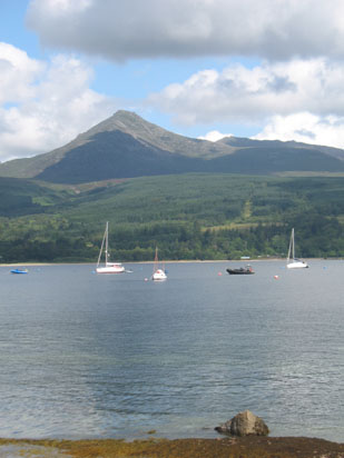 Picture of   Goatfell from Brodick Beach with sailboats is shown on this page.