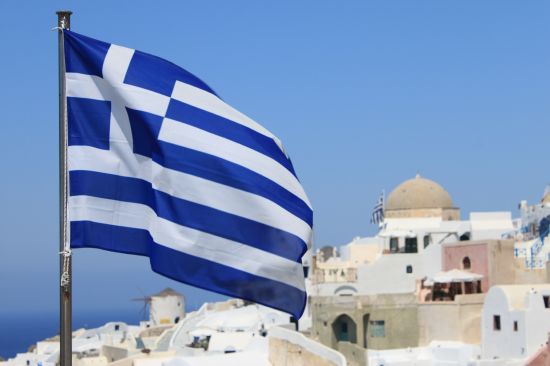 Picture of the  Greek Flag With Rooftops - Oia, Santorini, Greece