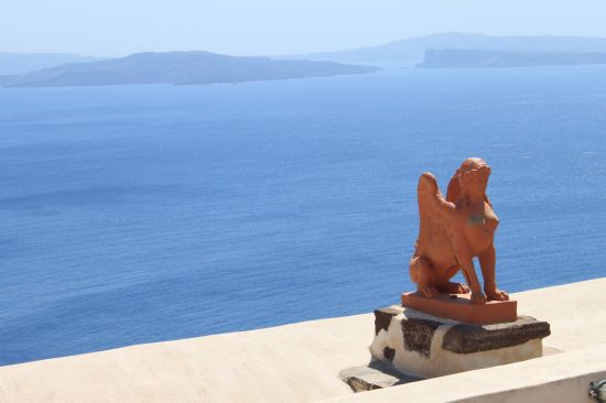 Picture of a Greek Sculputre Against Agean Sea - Oia, Santorini, Greece