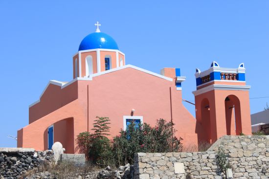 Picture of the  Salmon Pink Church With Blue Dome - Oia, Santorini, Greece