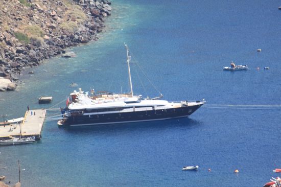 Picture of a Superyacht Docked At Oia - Oia, Santorini, Greece