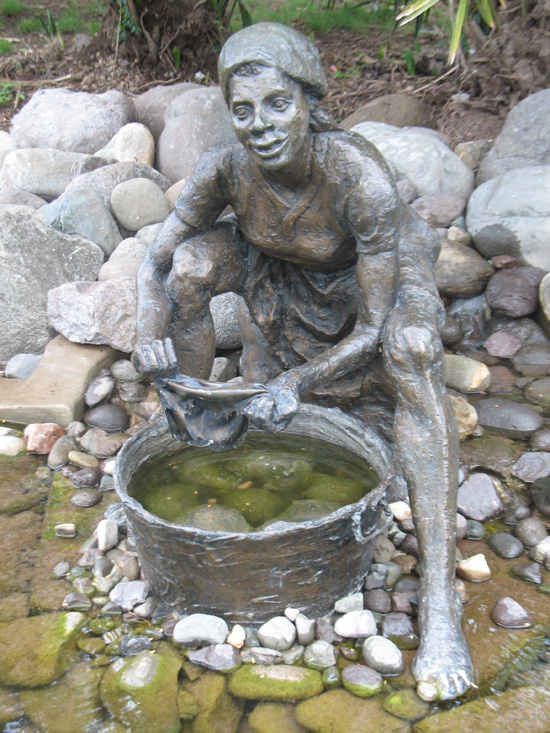 Picture of  The  Statue At Pond at Hope Botanical Gardens, Kingston, Jamaica is shown on this page.
