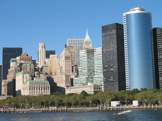 Picture of  The Manhattan Skyline from Statue of Liberty Boat, New York, USA is shown on this page.