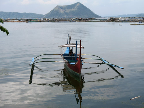 Picture of  a Catamaran at Lake Taal, The Philippines is shown on this page