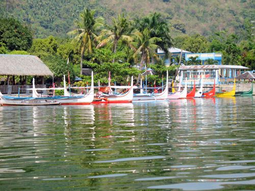 Picture of  The Colourful Catamarans at Lake Taal, The Philippines is shown on this page