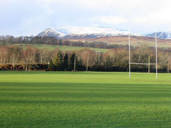 The sportsground in Creiff with snow on the hills in the background.