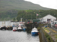 boats at close up portree harbour scotland picture
